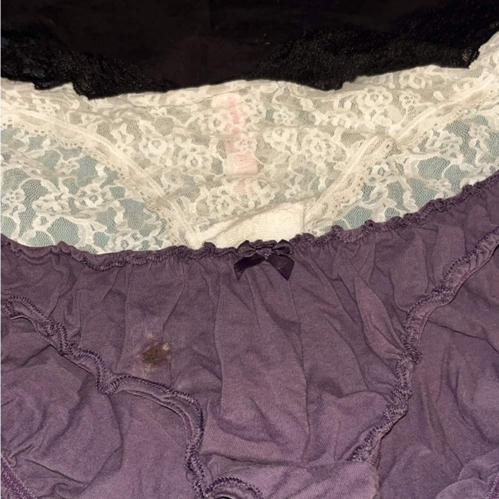 Women’s panties by Victorias Secret. A purple pair, a white and a black